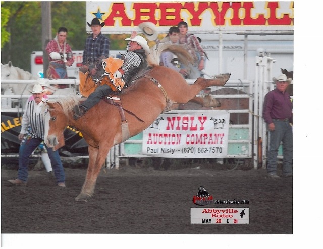 Justin Lindquist, Lindsborg, shows his championship bareback bronc riding style at the Abbyville, Kansas, PRCA Rodeo in 2011, where he marked 78 points, on Runaway Ramp from the New Frontier Rodeo Company string.