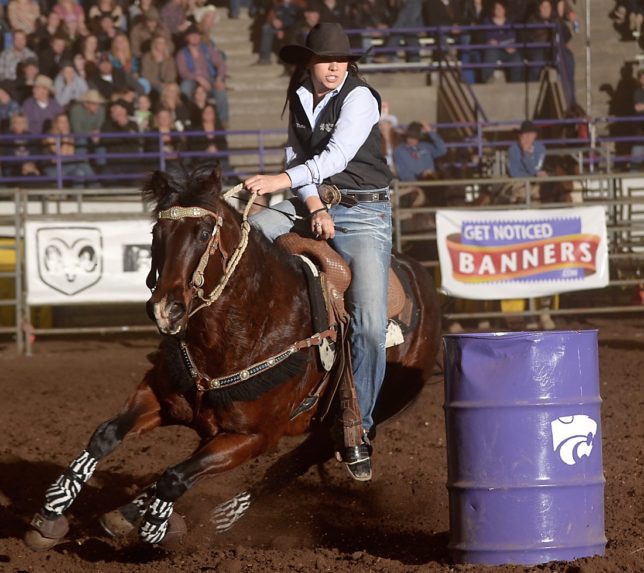 A native of South Dakota, Cally Thomas, as a member of the K-State Rodeo Team, placed first in the short-go, second in the long-go and was first in the average of the barrel racing event during the recent Kansas State University Rodeo at Manhattan. (Photo by www.dalehirschman.com.)