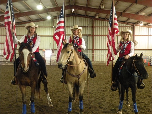 All decked out in their red, white and blue outfits, three members of the newly formed Kansas Pride and Glory Riders patriotic drill team practiced earlier this week for their debut performance at the Burlingame Rodeo, May 17-18. Left to right are: Amy Bermudez, Berryton; Bonnie Thorne, Wakarusa; and Lori Walker, Overbrook.