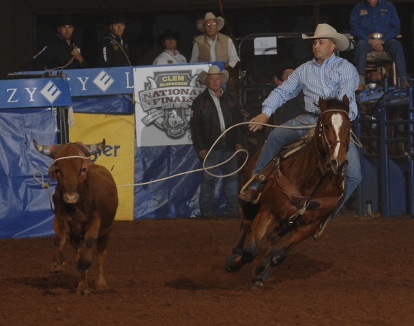 Rocky Patterson of Pratt shows the form that took him to his third world champion steer roper title at the National Finals Steer Roping in Guthrie, Oklahoma.