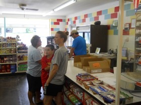 Customers were ample on Independence Day morning as manager Aaron Monihen assisted them at the newly refurbished, restocked, service-oriented Alta Vista Market.
