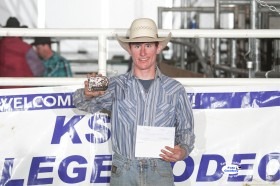 Matt May of Sydney, Arkansas, took home the first place check and championship buckle for 169 points on two bulls covered in the first two rounds at the 2014 K-State Invitational Bull Bash in Manhattan. (Photo generous courtesy of FotoCowboy® Kent Kerschner/Kent Kerschner Photography.)