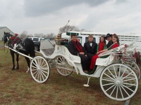 Billed as RC Elegance, Cindy Branham’s vis-à-vis pulled by her black and white Paint stallion, Oreo, will be a feature during the Winter Wonderland at Lake Shawnee this weekend, as well as additional days, through the holiday season. Colten, Justin, Madison, Ryan and Cindy Branham are in the carriage.