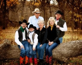Flint Hills ranch and rodeo heritage continues for generations in this Eureka family, as Clint and Irlene Huntington (center) are with their daughter and her husband, Heather and Cory Fuesz, and grandsons, Clinton and Cash. (Photo by Conard Studios.)