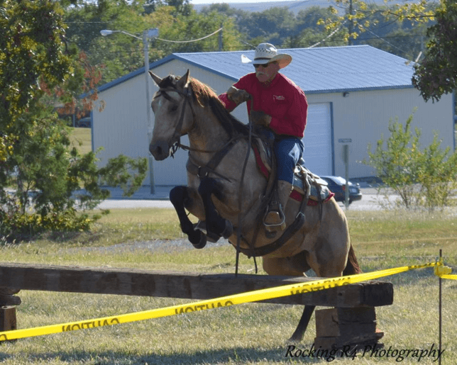 Entrepreneur in most all endeavors equine, Rex Buchman of Burdick helped in organizing the Ultimate Horseman’s Challenge Association and his shown riding Hollywood Bear Cat, aka Oso, over a jump obstacle in a competition sponsored by that group this year at Strong City.