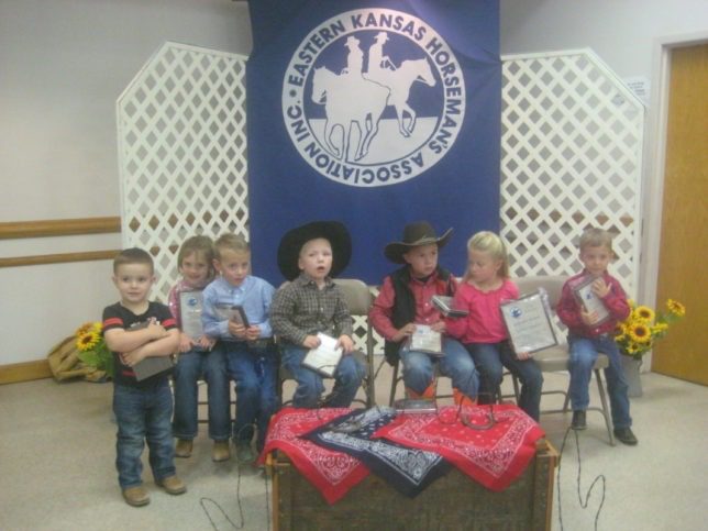 Future of the Eastern Kansas Horseman’s Association is the six-and-under division participants. Enthusiast little riders collecting their yearend event awards at the presentations banquet in Clay Center were Nolan Langvardt, Shea Augustine (Highpoint), Witt Keesecker, Hudson Lange, Logan Hickey, Rowley Keesecker (Reserve Highpoint) and Layton Purdue. (Photo courtesy of Shirley McDonald.)