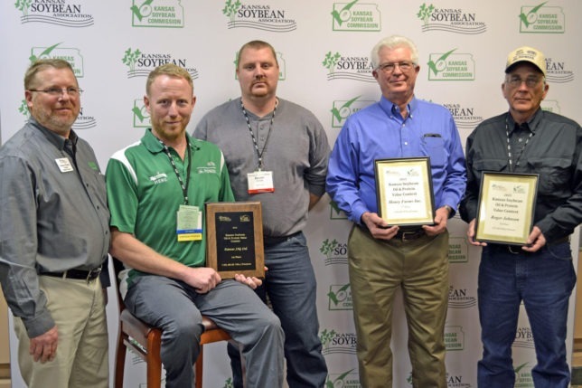 Kansas Soybean Oil and Protein Value Contest winners were recognized at the Kansas Soybean Expo in Topeka. Left, Raylen Phelon, Melvern, president of the Kansas Soybean Association, presented awards to Mark Pettijohn and Dustin Conrad, Kansas JAG, Ltd., Salina County, first; Bob Henry, Henry Farms, Inc., Brown County, second; and Roger Johnson, Sheridan County, third. (Photo from the Kansas Soybean Commission.)