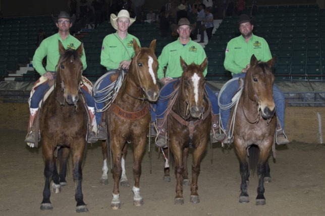 First place in the Saturday night ranch rodeo during the recent EquiFest of Kansas at Topeka went to the Lonesome Pine Ranch of Cedar Point. Team members include Chris Potter, Troy Higgs, Bud Higgs and Travis Duncan, who won the Top Horse Award at that performance. (Photo by Mindy Sue Andres.)