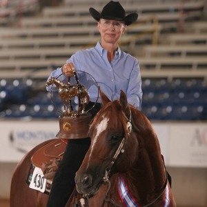 Proud time for Missy Hood and Watch This Way collecting an American Quarter Horse Association Select World Show trophy.