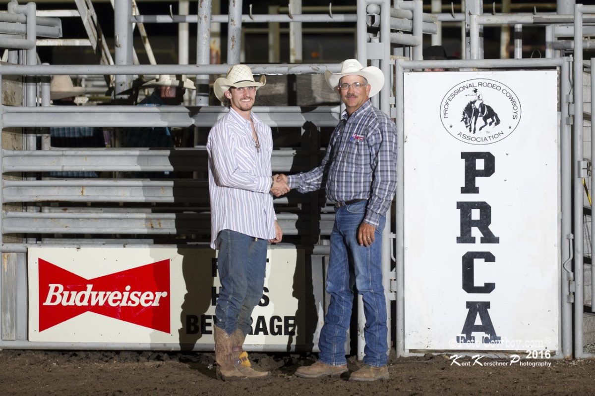 Ty Boor, Medicine Lodge, was awarded a $2,056 winner's check and Flint Hills Bull Blowout trophy belt buckle given by Brad Miller of Jim's Cowboy Shop at Emporia, and presented by Kim Reyer of Reyer's Country Store and Flint Hills Genetics bucking bull breeding program.  