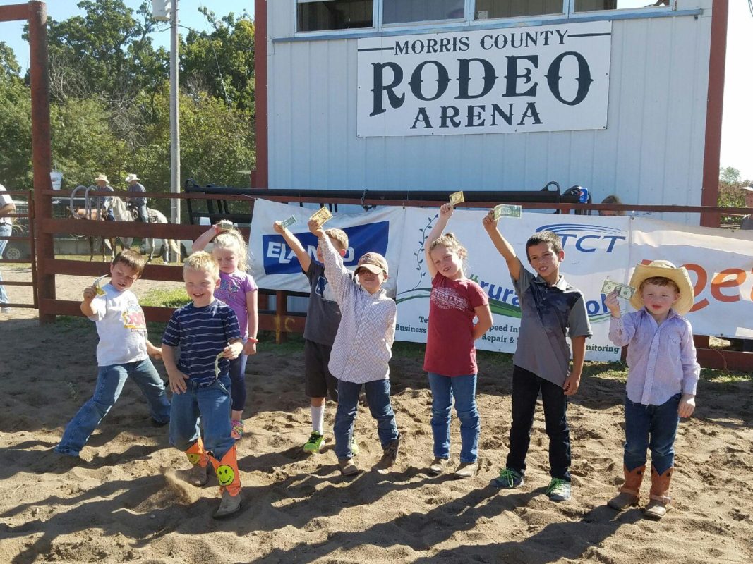 It’s impossible to keep a little wild bunch calm as eight cowboys and cowgirls flashed their greenbacks received as prizes for riding in the Mutton Busting during the Morris County Invitational Ranch Rodeo at Council Grove. 